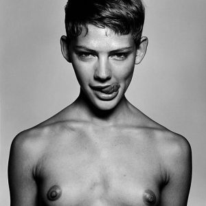 Emily Breeding by Rankin, black and white portrait of nude model with tounge out