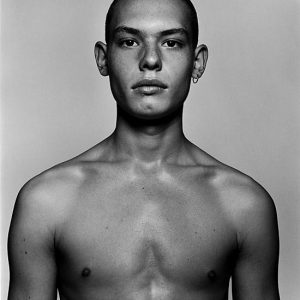 Sebastian Breeding by Rankin, black and white portrait of nude male model with and earring