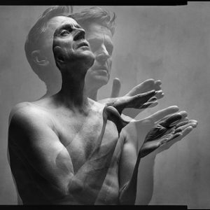 Mikhail Baryshnikov by Mark Seliger, double exposure portrait of the ballett dancer in a praying gesture