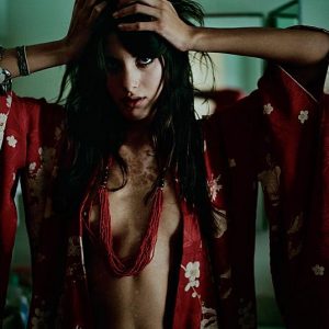 BIRTHMARK – SONJA KINSKI by Marc Baptiste, model in red kimono and necklace, hands in her hair