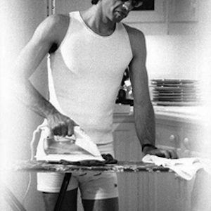 Mick Jagger Ironing by Alison Jackson, fake Paparazzi shot of the musician in underwear, ironing