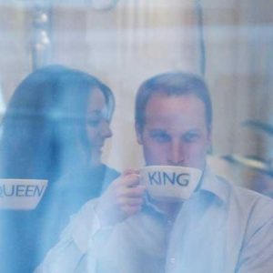Wills and Kates King and Queen Cups by Alison Jackson, lookalikes of the royal couple drinking from labeled teacups