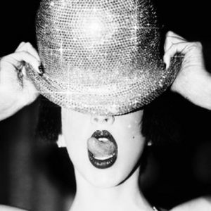 Ellen von Unwerth, Bienvenue, Christina Aguilera, Glitter, Disco, Hat, Portrait, Tongue, Vintage, Flapper, Black and white, black and white photography, fine art photography, limited editioin, light, portrait photography, celebrity portrait, singer