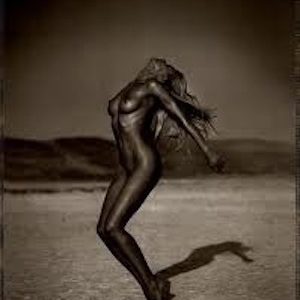 Ivet, Lesbos by Andreas H. Bitesnich, nude model standing in backwards bent pose in a desert