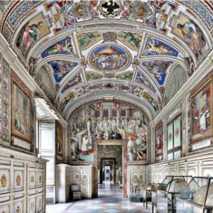 Biblioteca Apostolica by Massimo Listri, baroque hall with white and gold stucco and colorful fresco