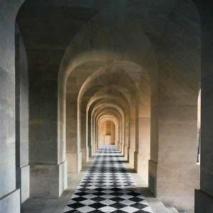 Galerie Basse by robert polidori, minimialistic stone collonade with checkerboad patterned floor