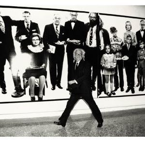 Richard Avedon, Milan 1995 by Roxanne Lowit, the photographer walking in front of one of his pieces