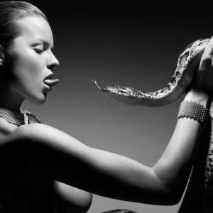 god created eva by Rankin, nude eva herzigovapointing her toune at a snake, b&w