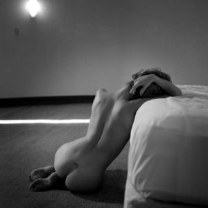 Guido Argentini - Dare to see things your way, nude model leaning on a bed