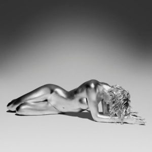 Sadarnuna by GuidoArgentini, silver painted model lying on the ground