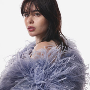 Barbie Ferreira - Masthead Magazine, NYC 2017 by Albert Watson, the model in a purple feather shawl