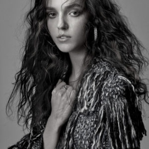 Emm Arruda - Glass Magazine - NYC 2018 by Albert Watson, black and white portrait of the model with curly hair wearing a wool jacket