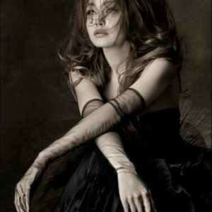 Gigi Hadid - Jason Wu - New York City 2019 by Albert Watson, the model in a black tulle gown and gloves with messy hair