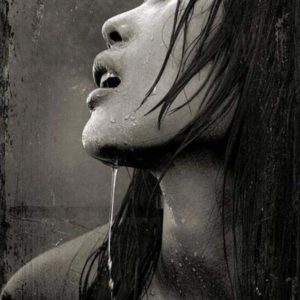 Erotic Nude 2010 #6017 by Andreas H. Bitesnich, black and white side profile of a model with water dripping down her face