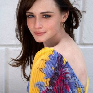 Alexis Bledel by iris brosch, portrait of the actress in a blue and yeallow pleated dress