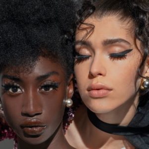 Staircase by Iris Brosch, portrait of two model with different skintone wearing bold eyeliner