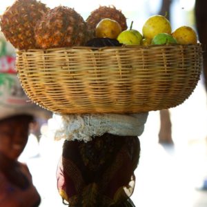 Haiti by Marc Baptiste, woman carrying a fruit basket on her head