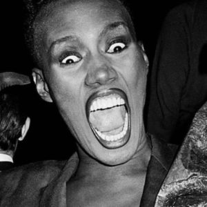 Grace Jones by Roxanne Lowit, portrait in b&w screaming