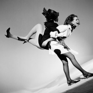 Linda Evangelista and Christy Turlington, 1990 by Arthur Elgort, the models dressed in black and white with polkadots, one lifting the other