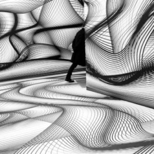 Grand Palais by Gérard Uféras, figure between abstract linedrawings on walls and floor