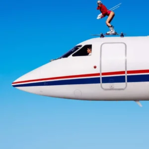 Tony Kelly, Off Piste, Model, Ski, Skiing, Winter jacket, fashion, legs, nude, aircraft, blue, blue sky, red and blu, color, color photoraphy, fine art photography, limited edition, contemporary Pop