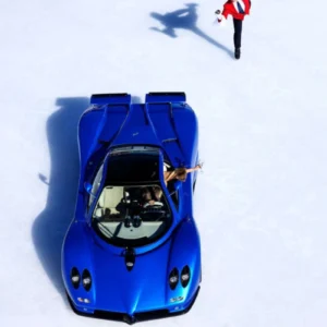 Tony Kelly, Pagani on Ice, Blue, Red, Color, Ice, Iceskates, Ice skating, skateing, Car, fast car, Pagani, Waiter, Surrealism, Funny, Winter, Snow, Color Photography, contemporary Pop, Fine art photography, limited edition