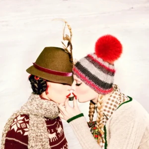 Ellen von Unwerth, Heimat, Shot for Two, Model, Wome, Red Lips, Snow, Winter, Alps, Tracht, Bavaria, Funny, Sexy, Color, Color Photography, fine art photography, limited edition, Heimat Series