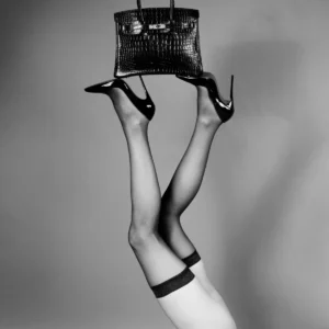 Tyler Shields fine art photography, "Legs Up Birkin" Tyler Shields, Tyler Shields black and white photography, Hermès Birkin bag photography, Birkin handbag fine art, luxury fashion fine art photography, high heel fashion photography, stiletto heel art photography, provocative fashion photography, conceptual fashion photography, minimalist black and white photography, surreal fashion imagery, iconic luxury symbolism photography, contemporary fine art photography, gallery-grade fine art photography, collectible contemporary photography, museum-quality photographic print, Tyler Shields limited edition print, Tyler Shields collectible fine art print, luxury fashion photography for collectors, legs up fashion photography, luxury accessories fine art